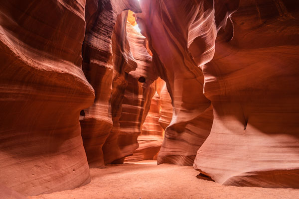 The textured sandstone walls of Antelope Canyon